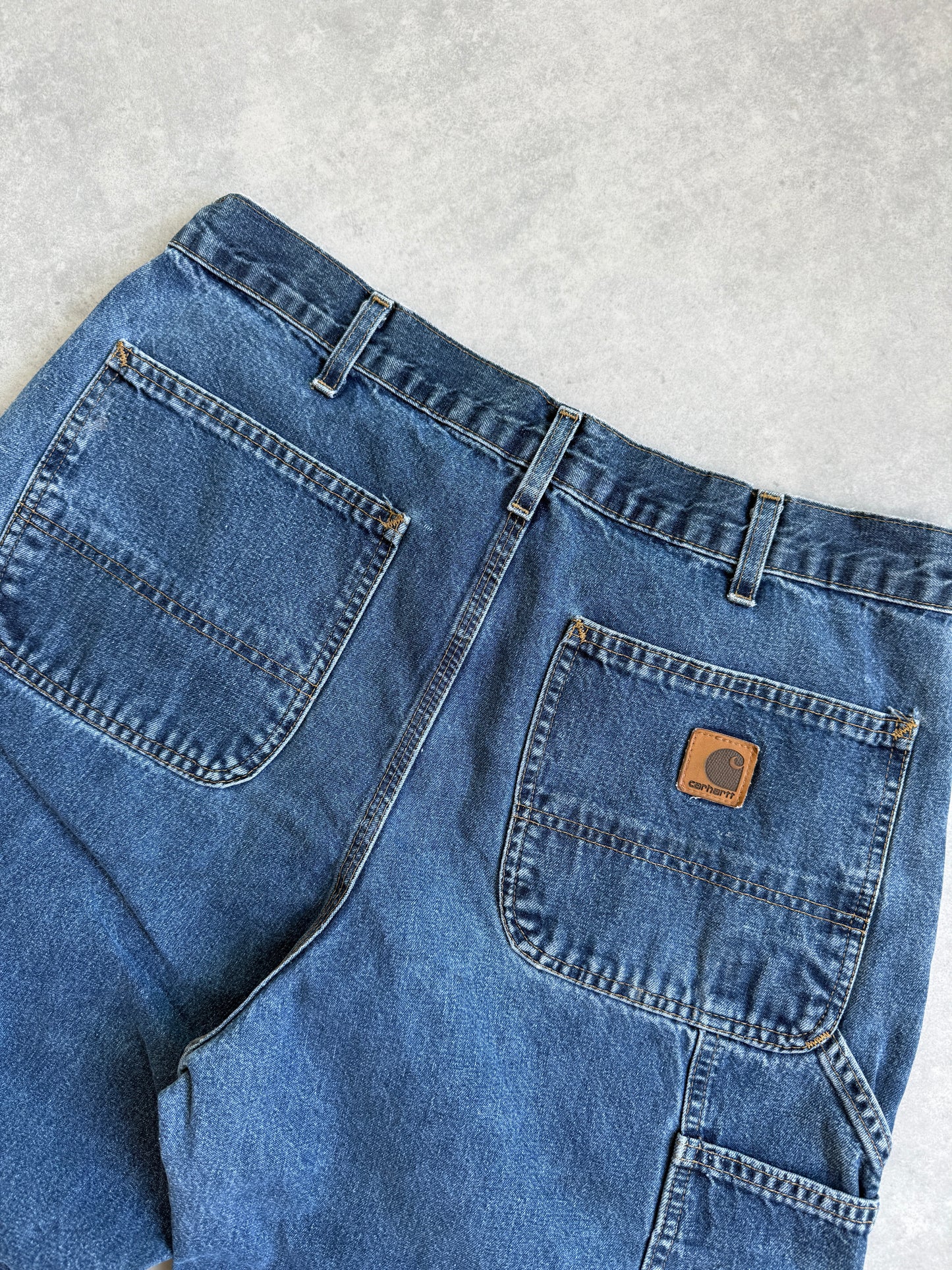 Carhartt muške vintage carpenter farmerke (34x30)