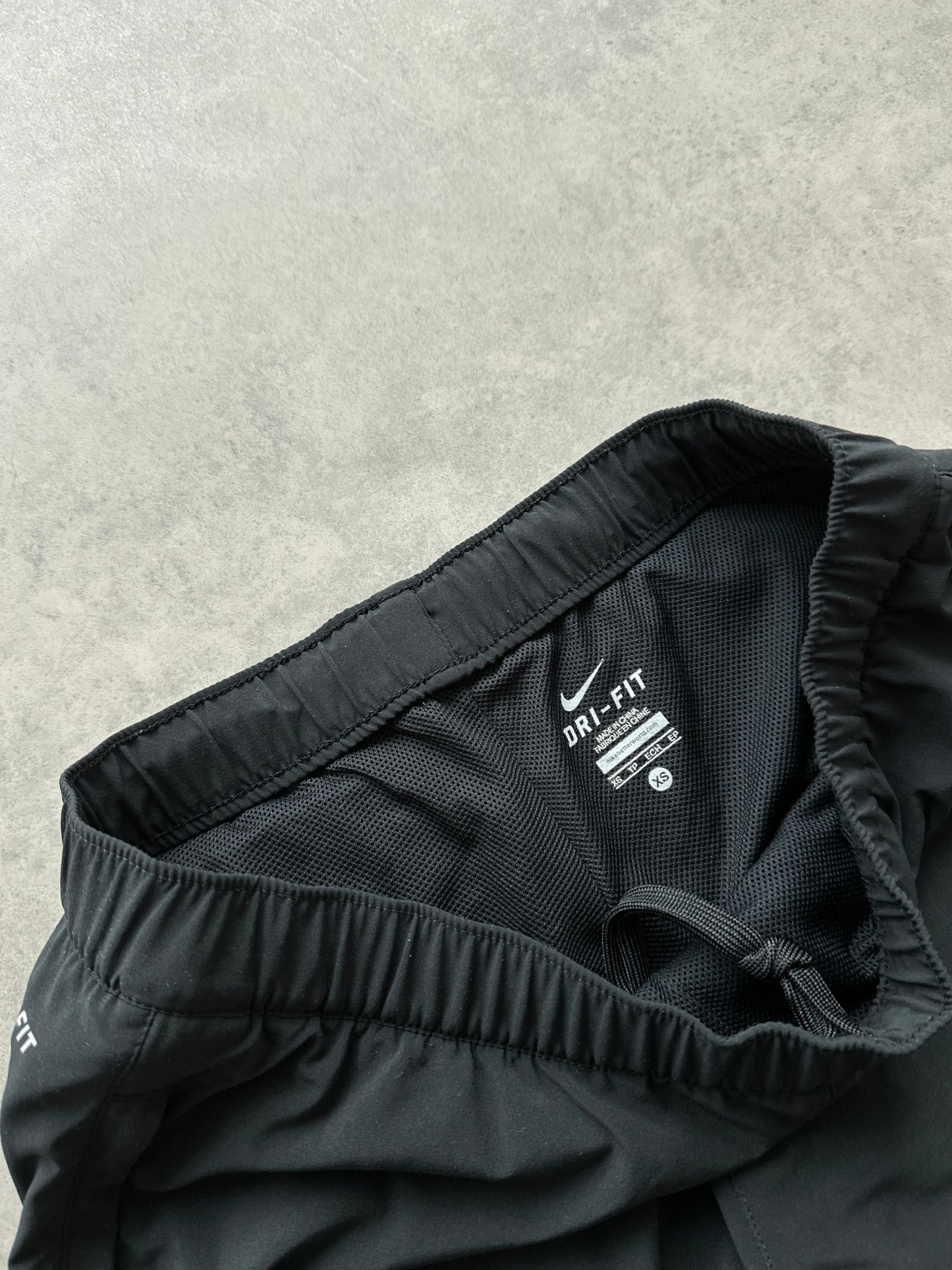 Nike ženska baggy crna šuškava trenerka (XS)