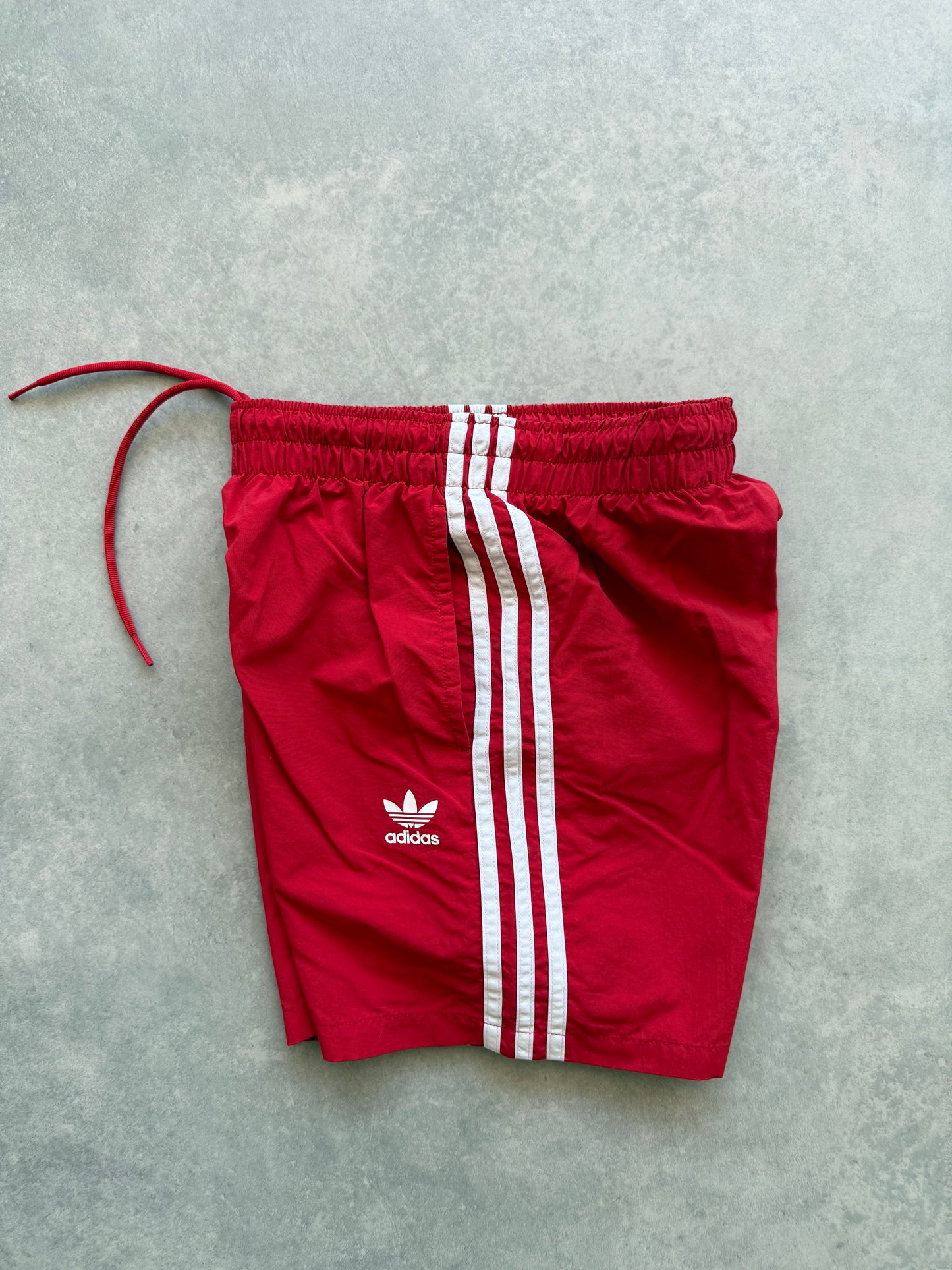 Adidas ženski crveni šorc (XS)