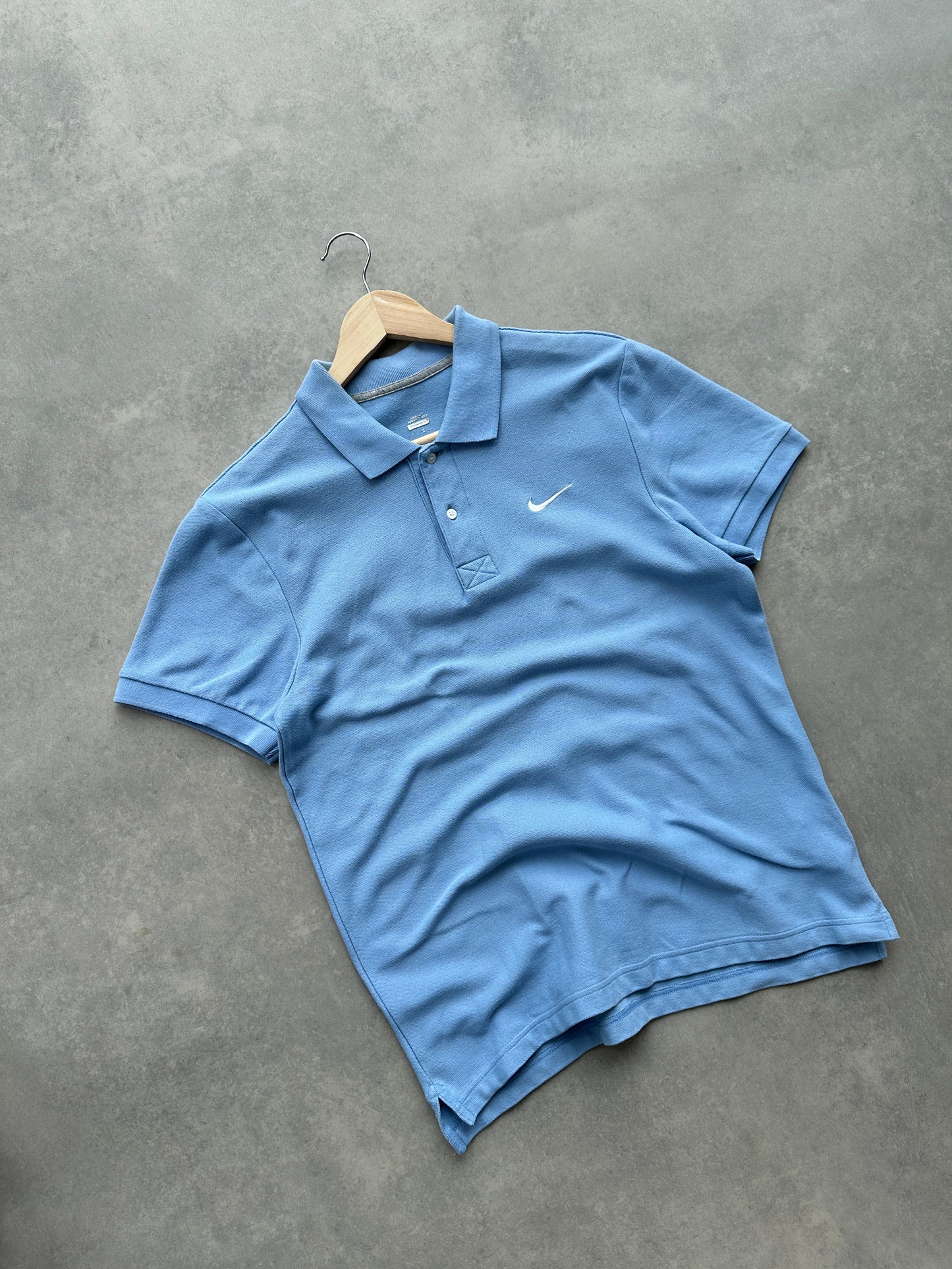 Nike muška plava polo majica (M)