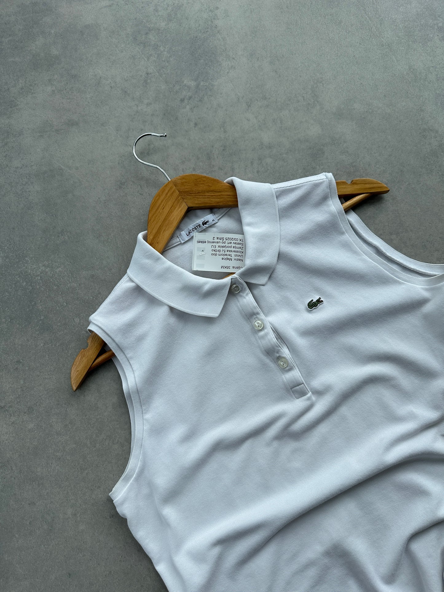 Lacoste ženska bijela polo majica bez rukava (44, 46)