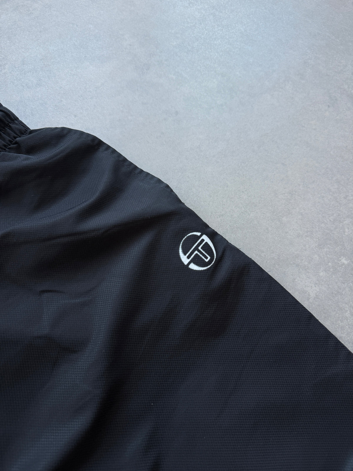 Sergio Tacchini muška crna šuškava trenerka (L)