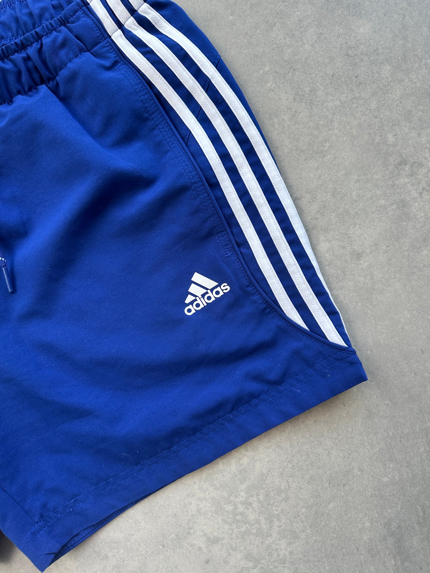 Adidas basic plavi muški šorc (M)