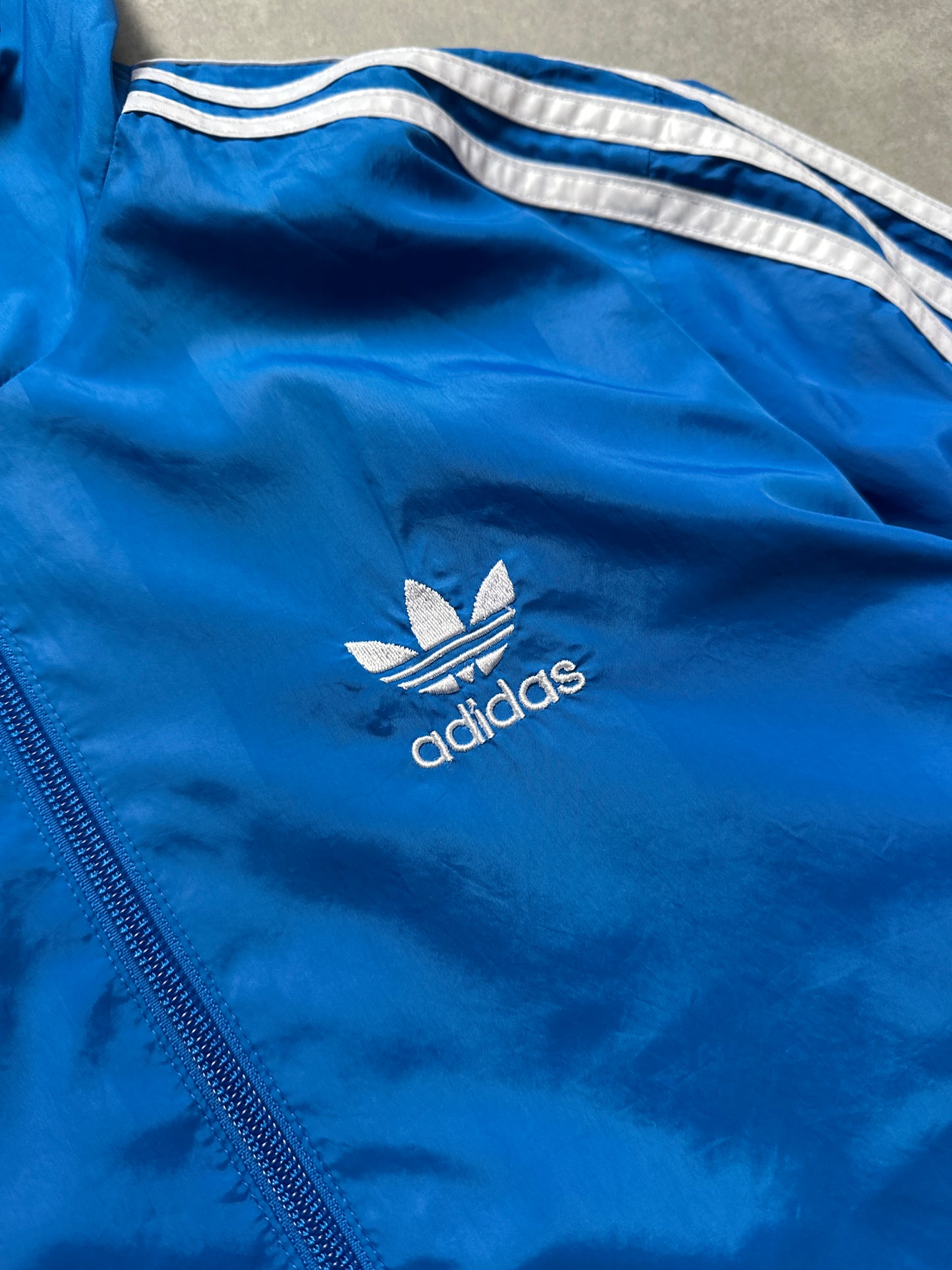 Adidas muška plava šuškava dukserica (XS)
