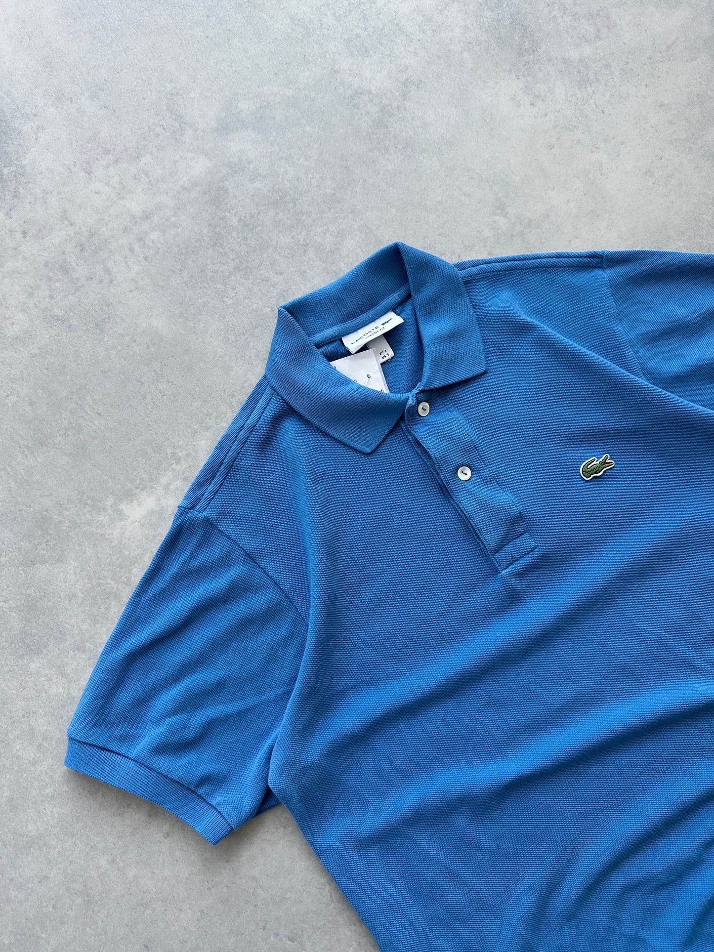 Lacoste muška plava polo majica (S)