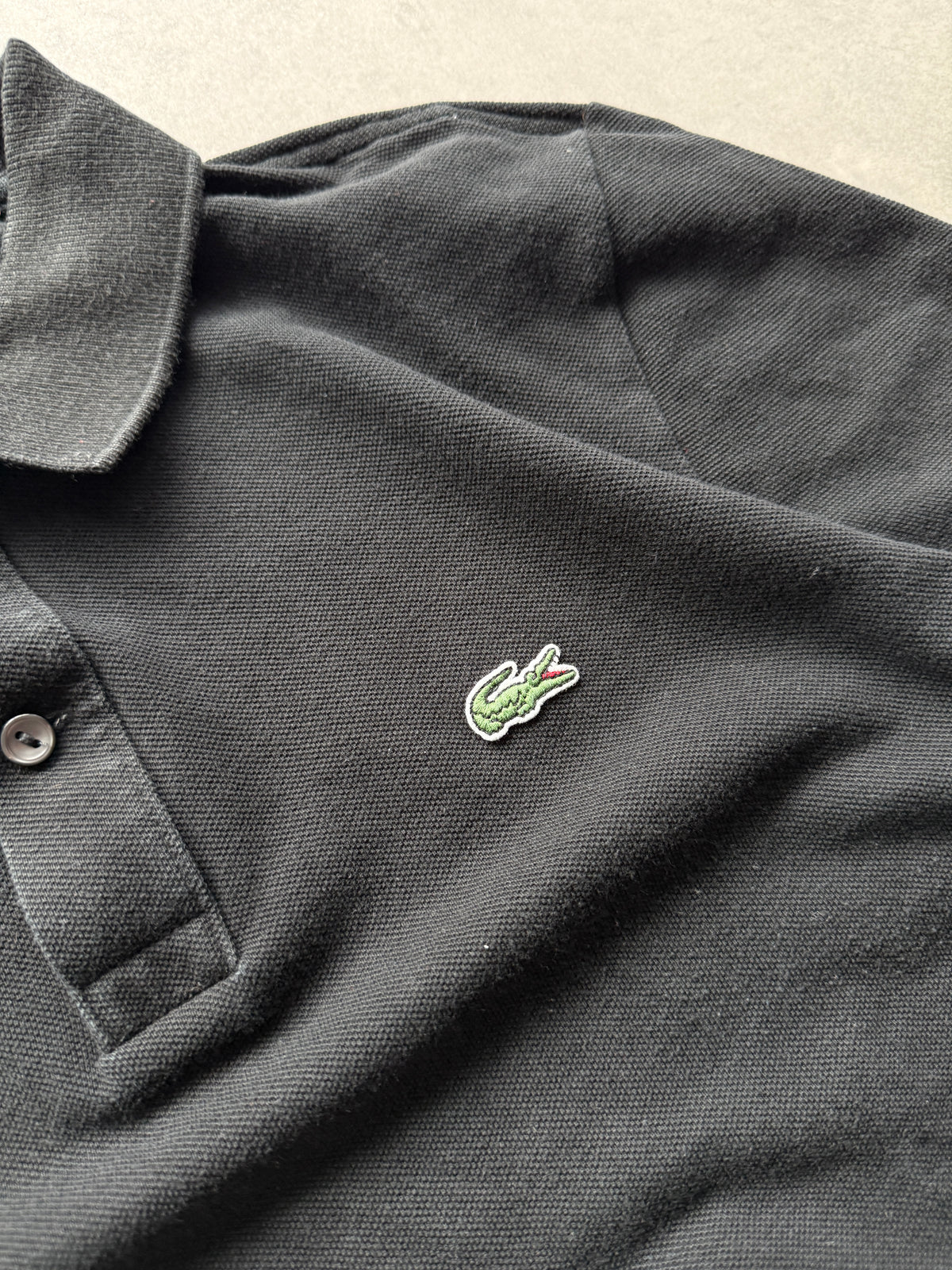 Lacoste muška crna slim fit polo majica (M)