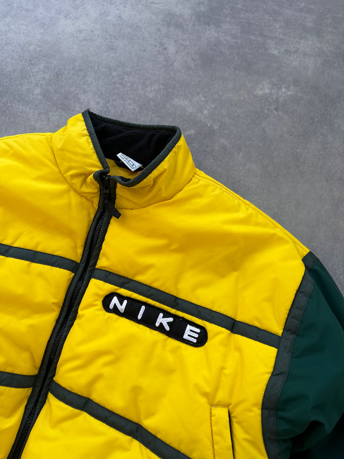 Nike 90s zenska zuta puffer jakna (L)