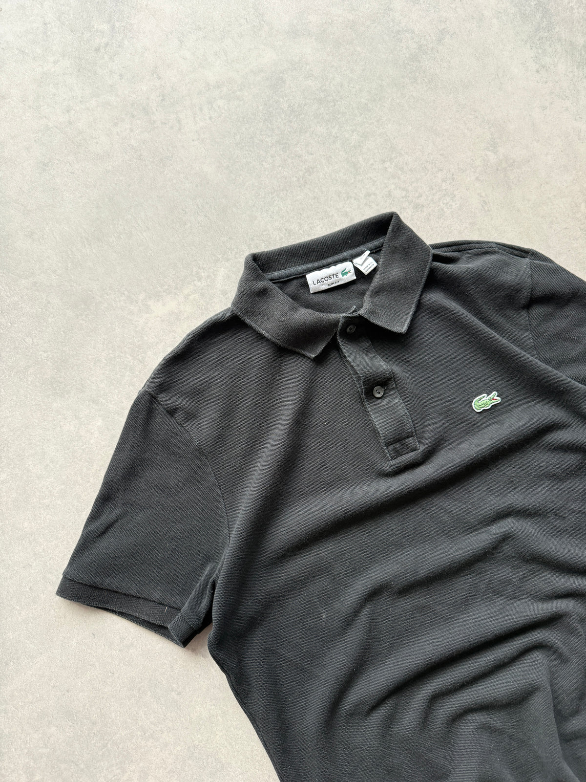 Lacoste muška crna slim fit polo majica (M)
