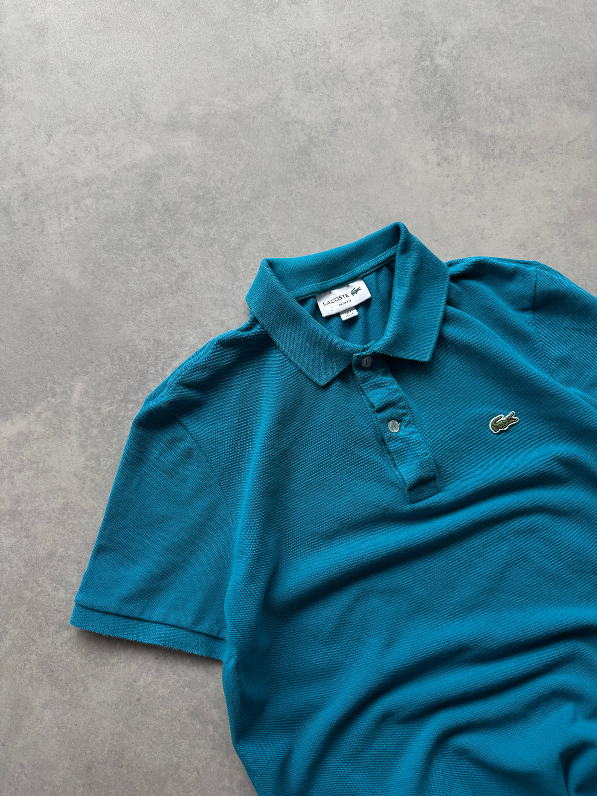 Lacoste muška plava slim fit polo majica (M)