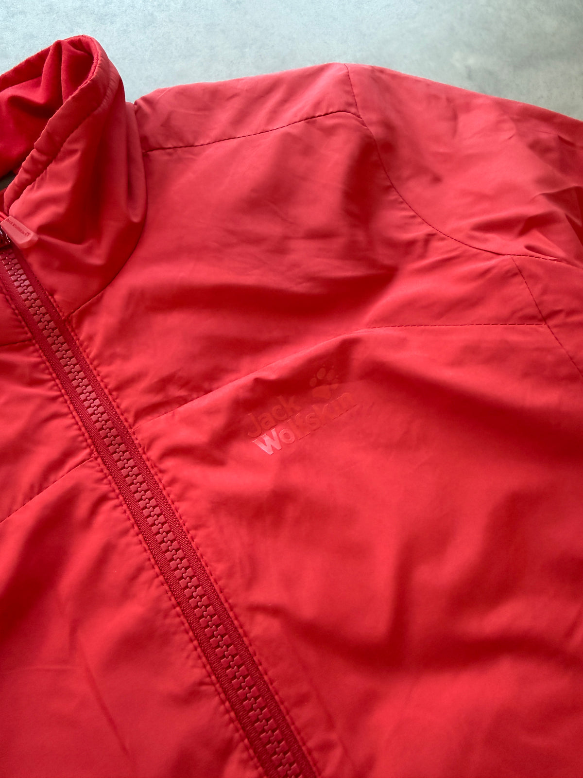 Jack Wolfskin ženska crvena tanka izolaciona jakna (XS)