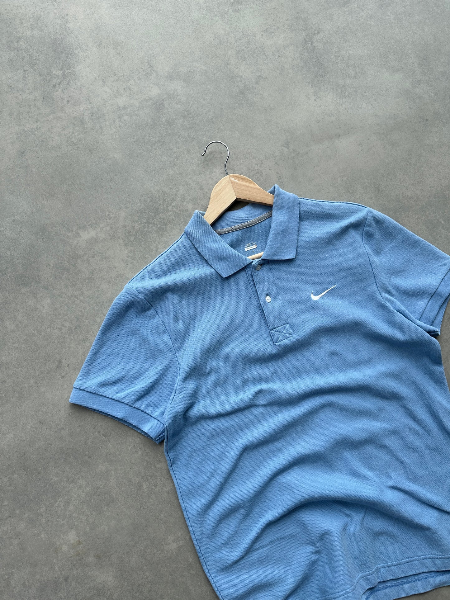 Nike muška plava polo majica (M)
