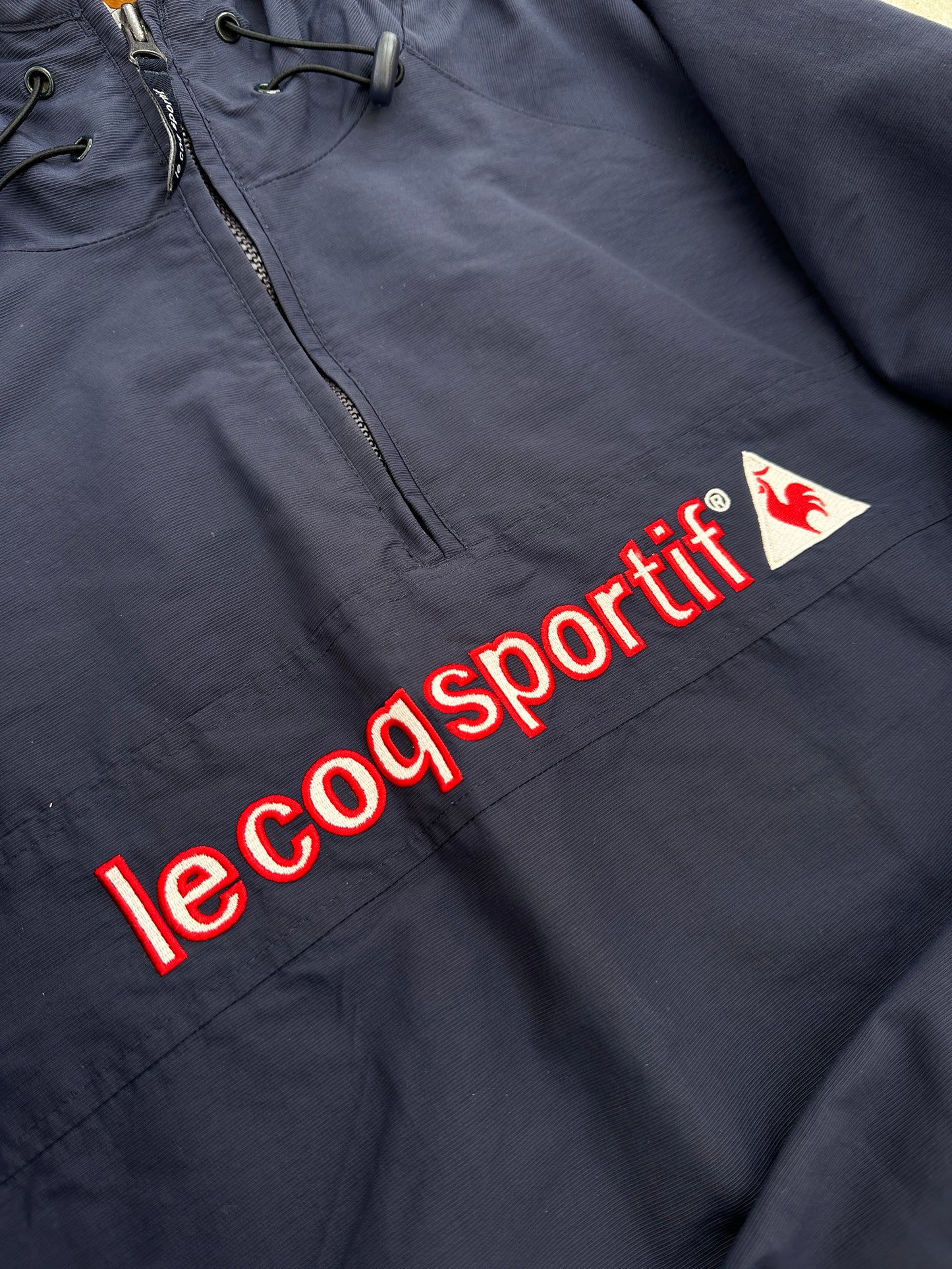 Le Coq Sportif 1/3 zip ženski šuškavac (L)