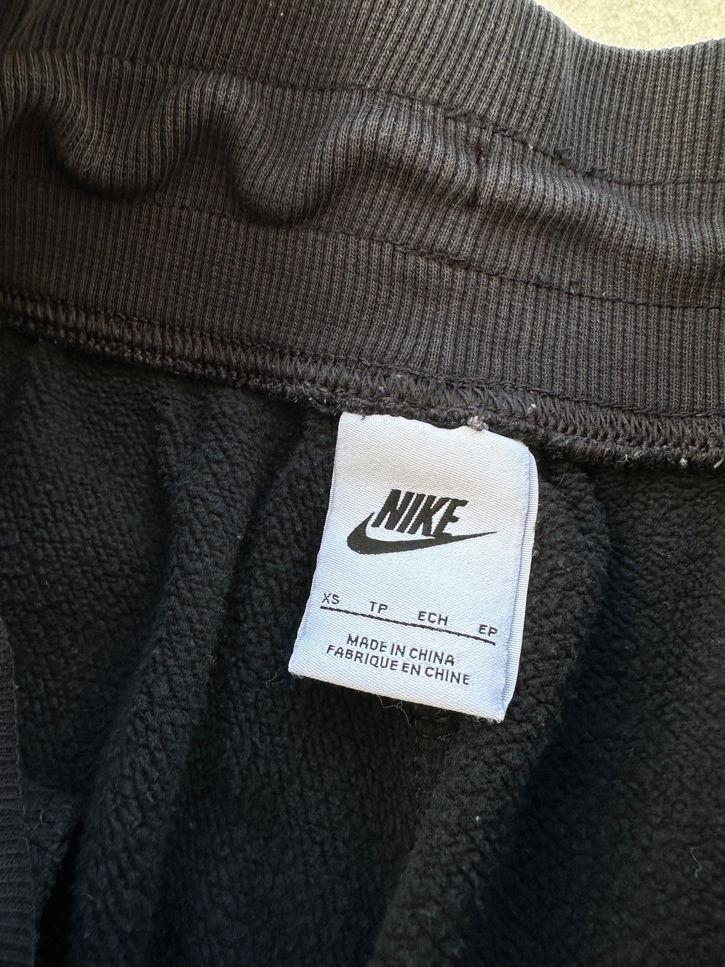 Nike ženska baggy fit crna trenerka (XS)