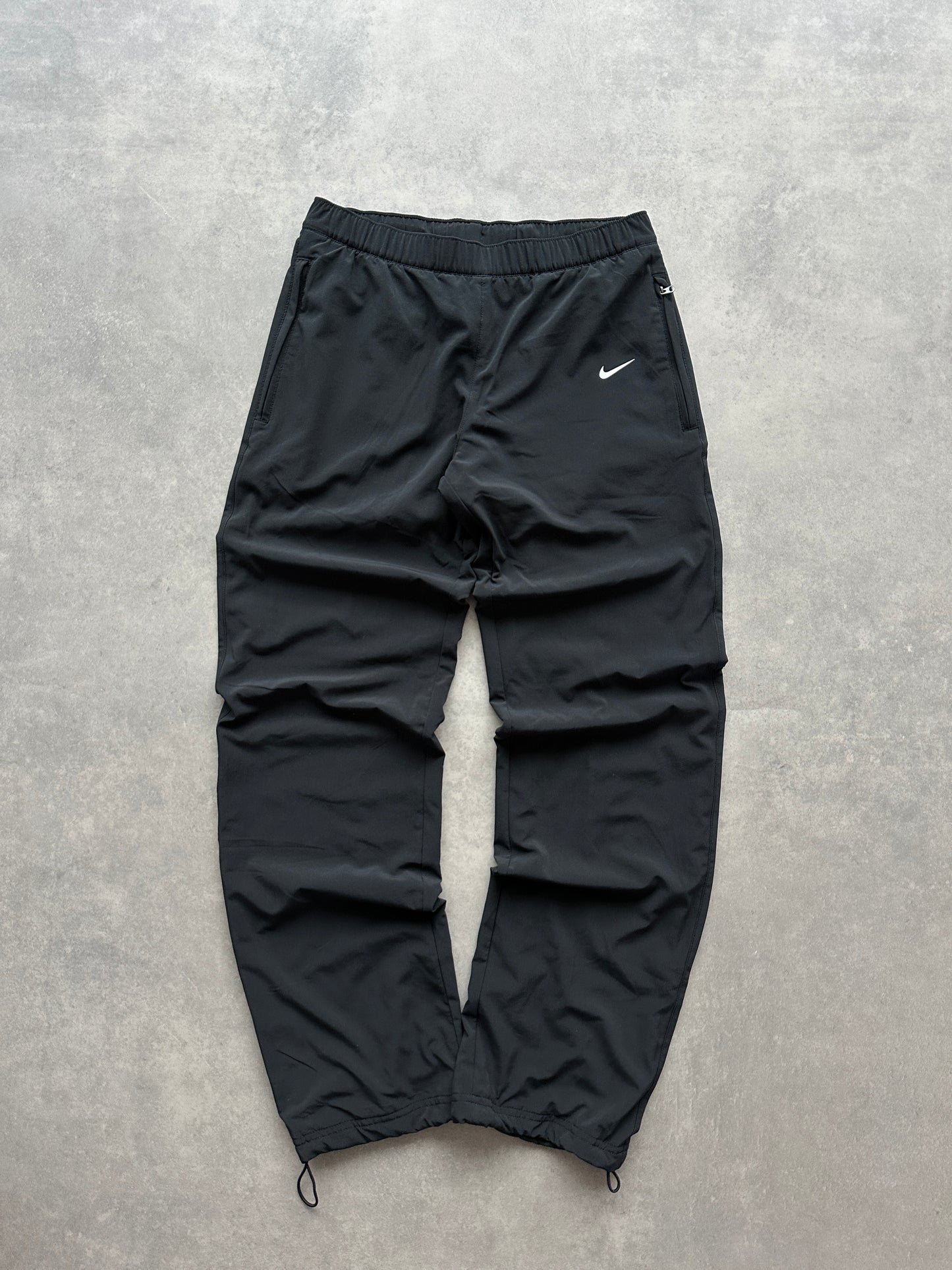 Nike ženska baggy crna šuškava trenerka (XS)