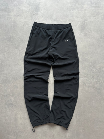 Nike ženska baggy crna šuškava trenerka (XS)