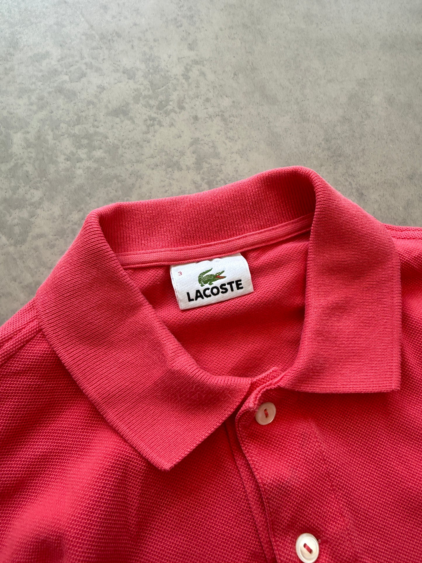 Lacoste muška roza polo majica (S)