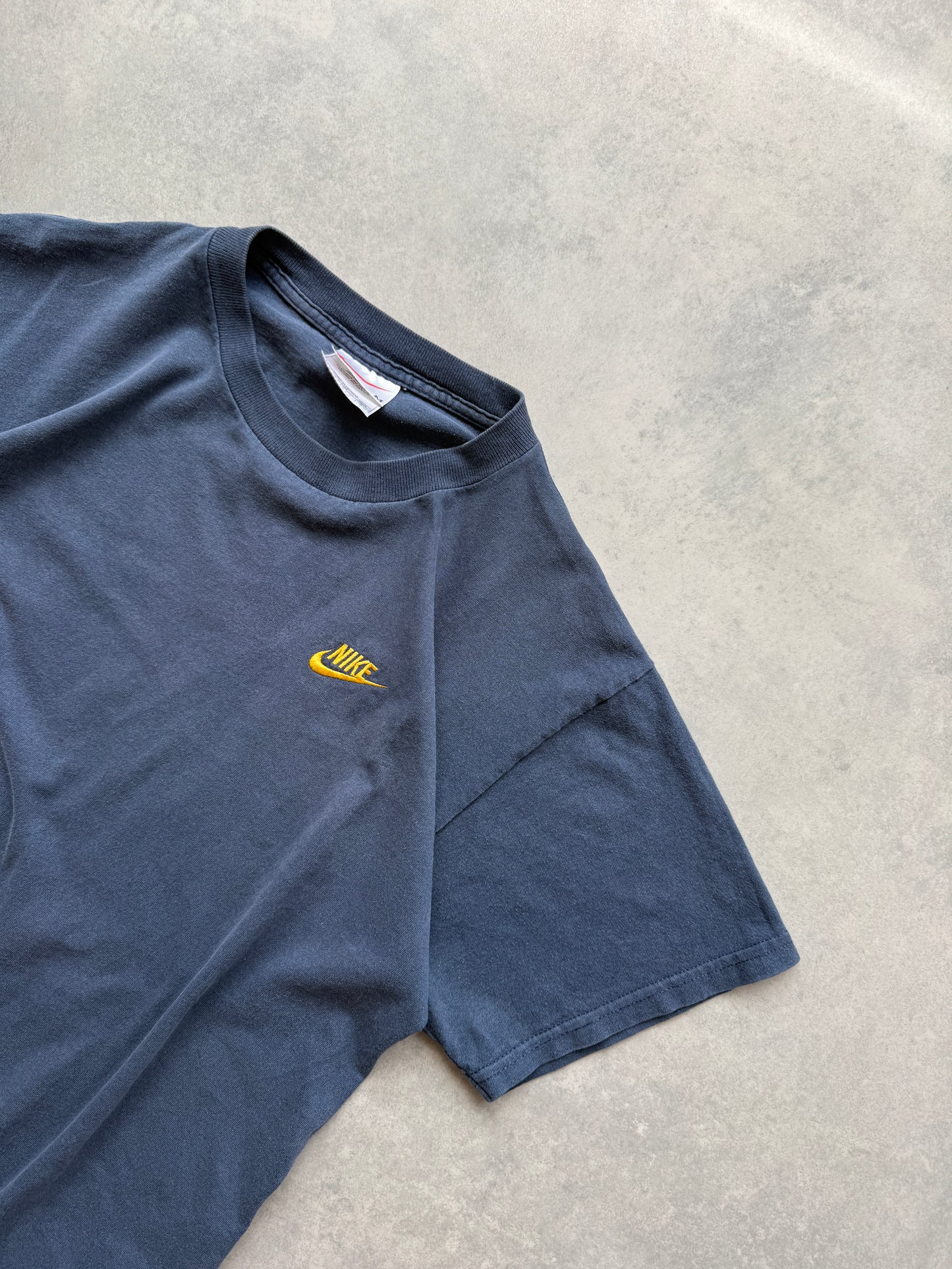Nike 90s muška oversized faded majica (M)