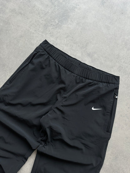 Nike ženska baggy crna šuškava trenerka (XS)