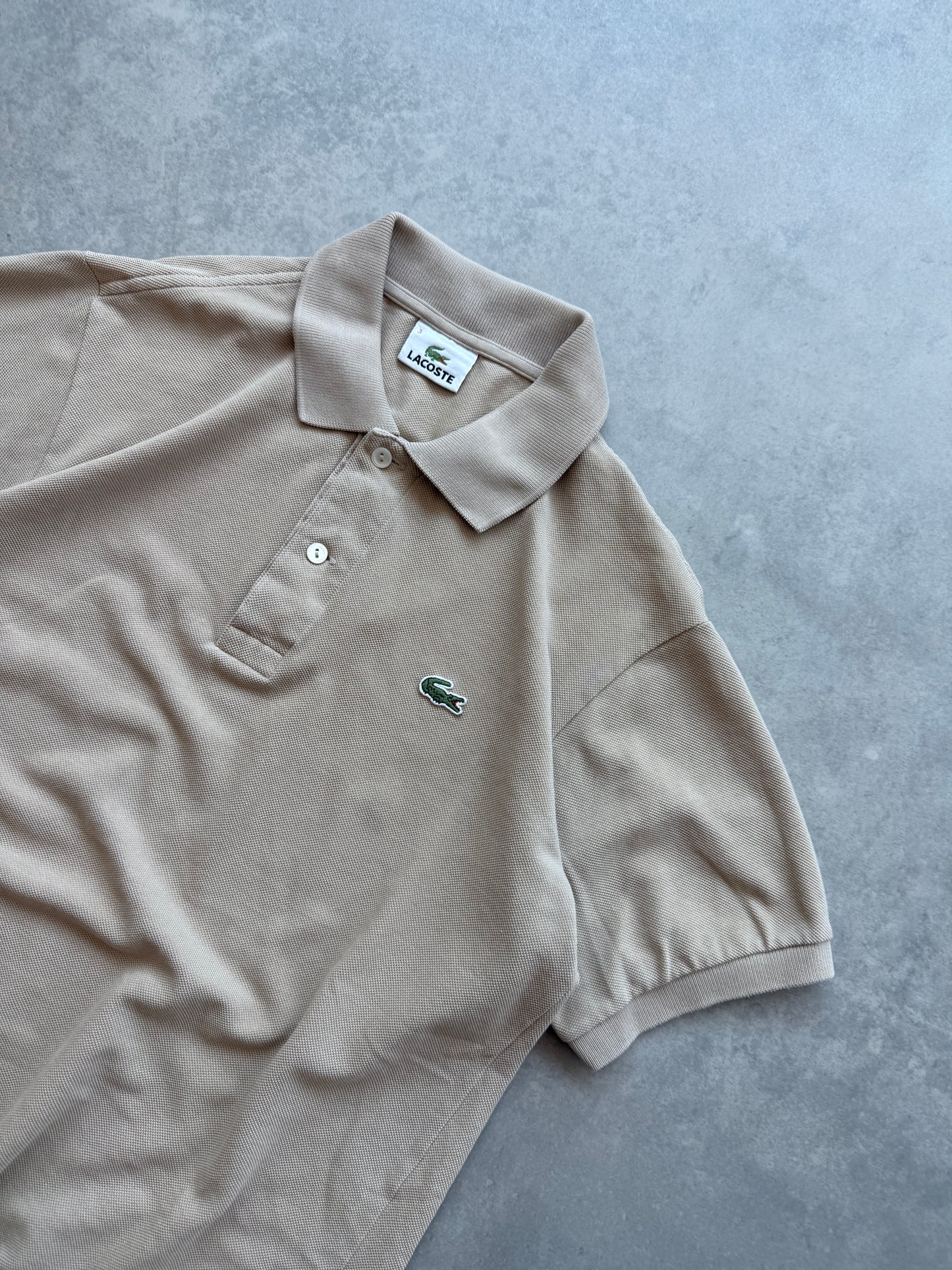 Lacoste muška bež polo majica (S)