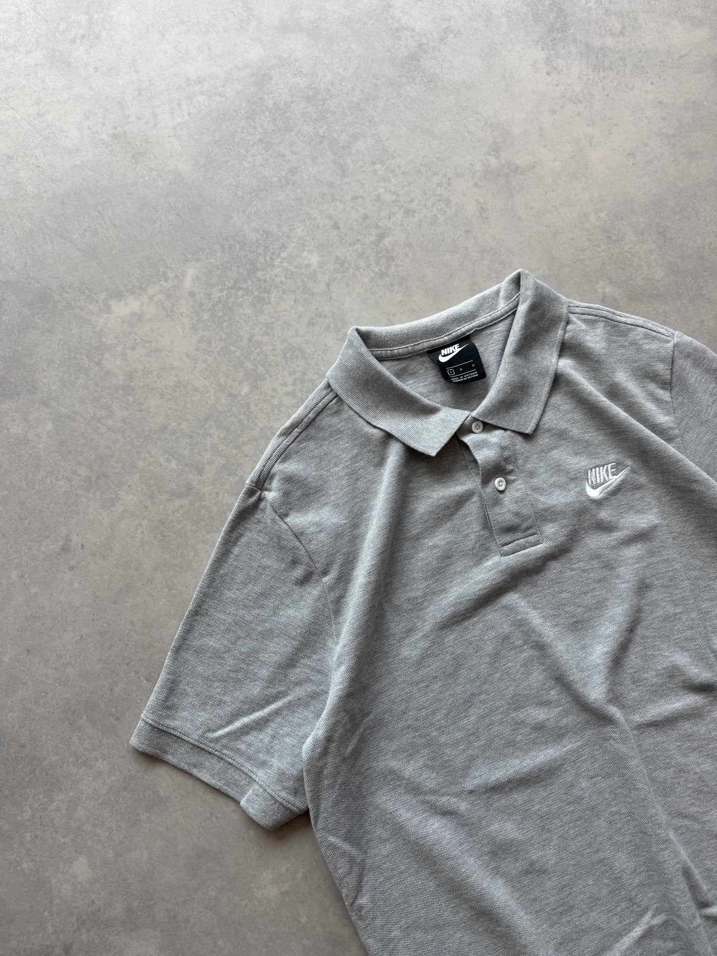 Nike muška siva polo majica (L)