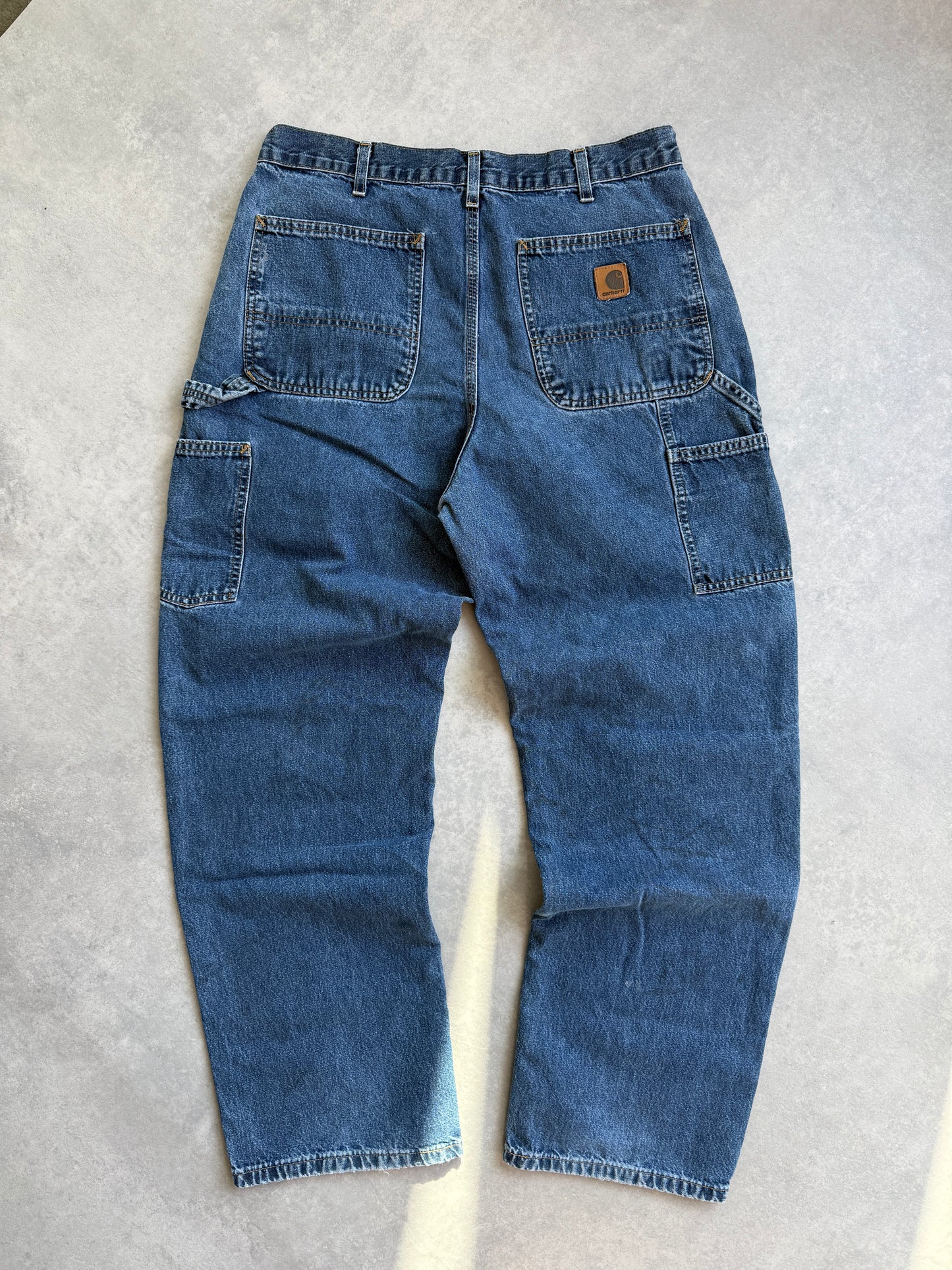 Carhartt muške vintage carpenter farmerke (34x30)