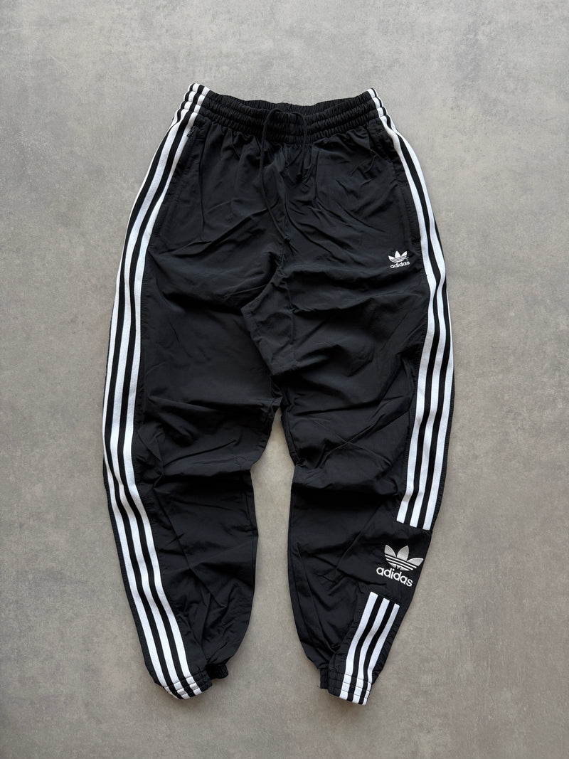 Adidas ženska crna šuškava trenerka (XS)