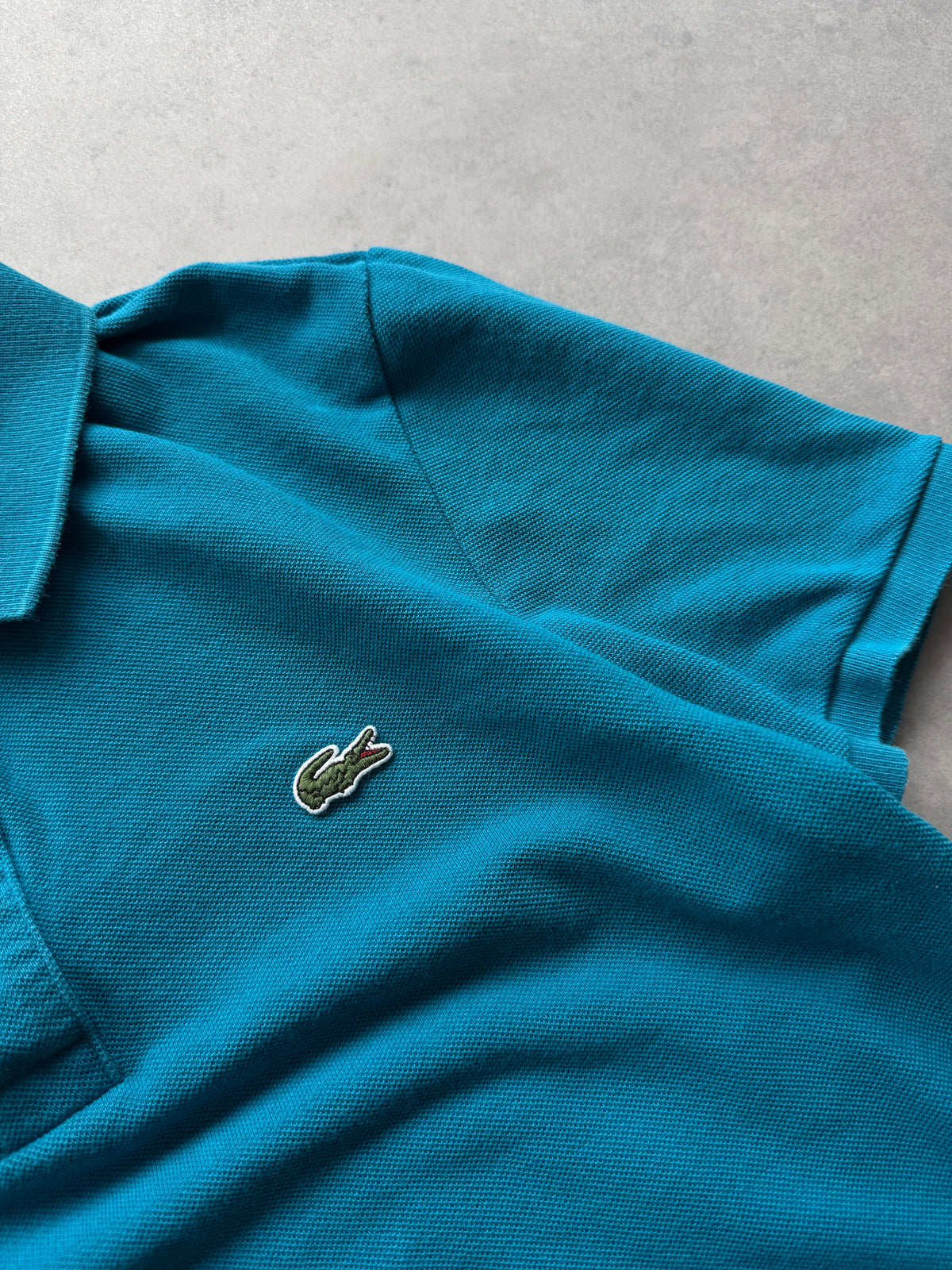 Lacoste muška plava slim fit polo majica (M)