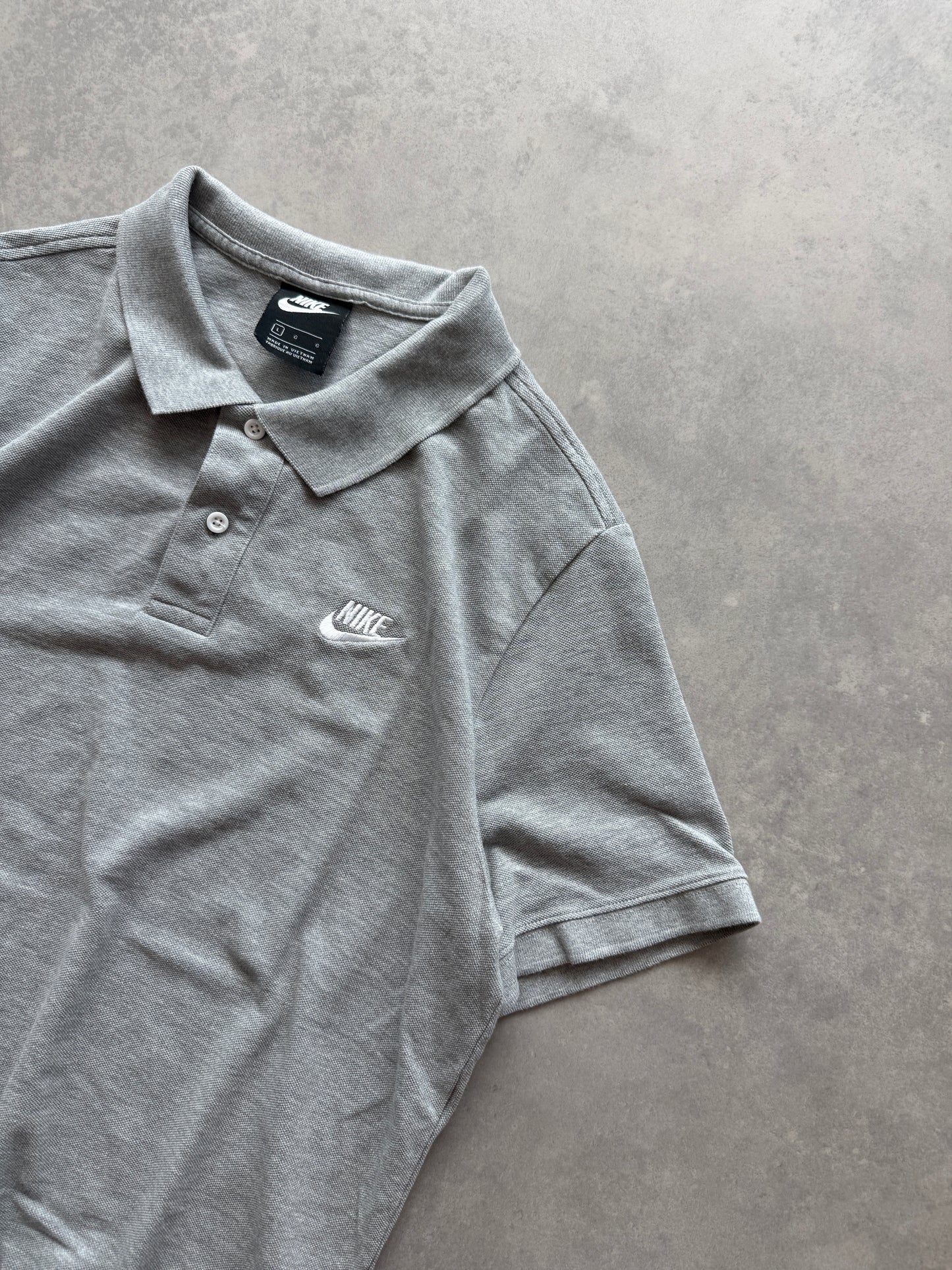 Nike muška siva polo majica (L)