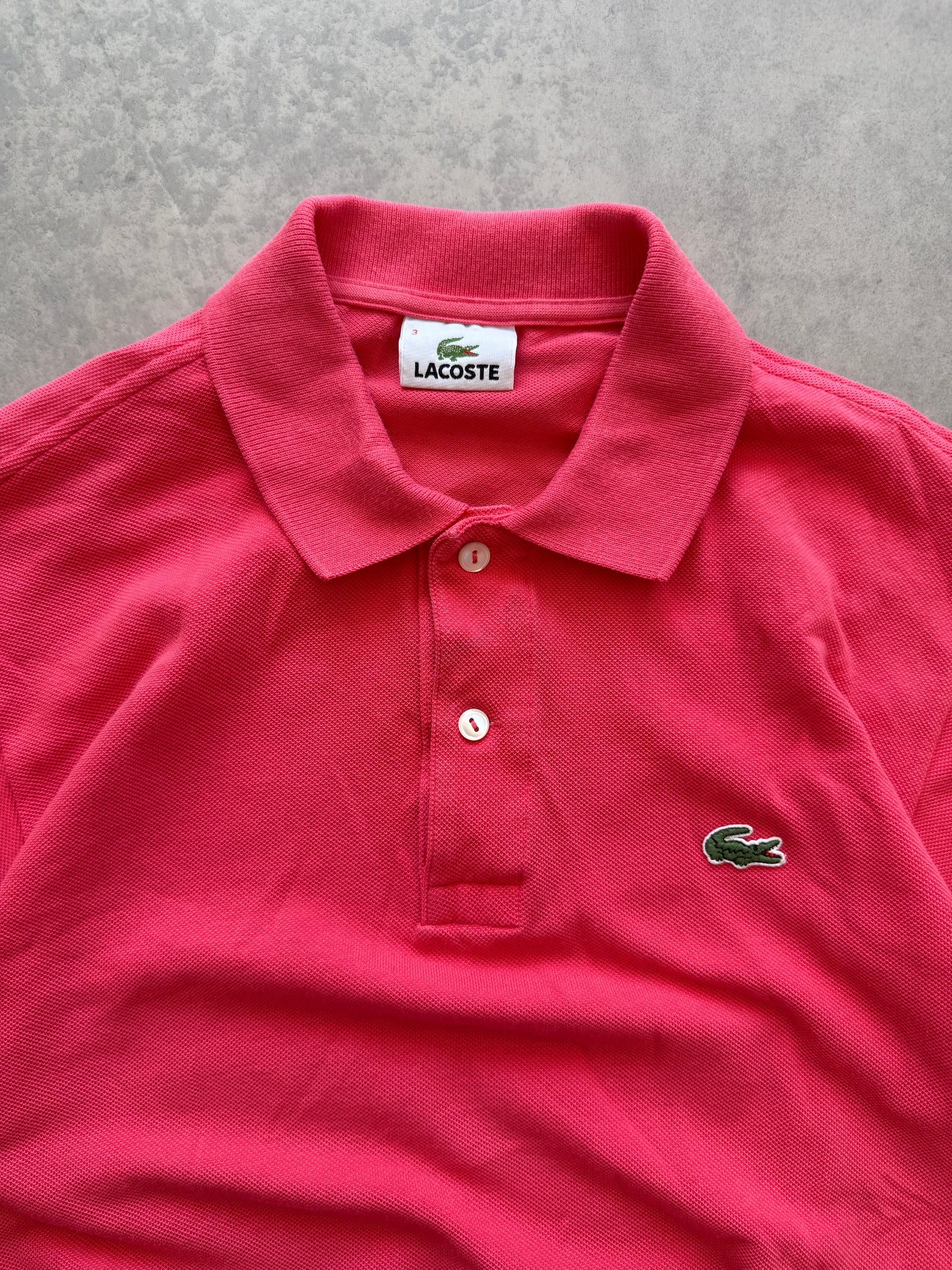 Lacoste muška roza polo majica (S)