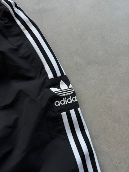 Adidas ženska crna šuškava trenerka (XS)