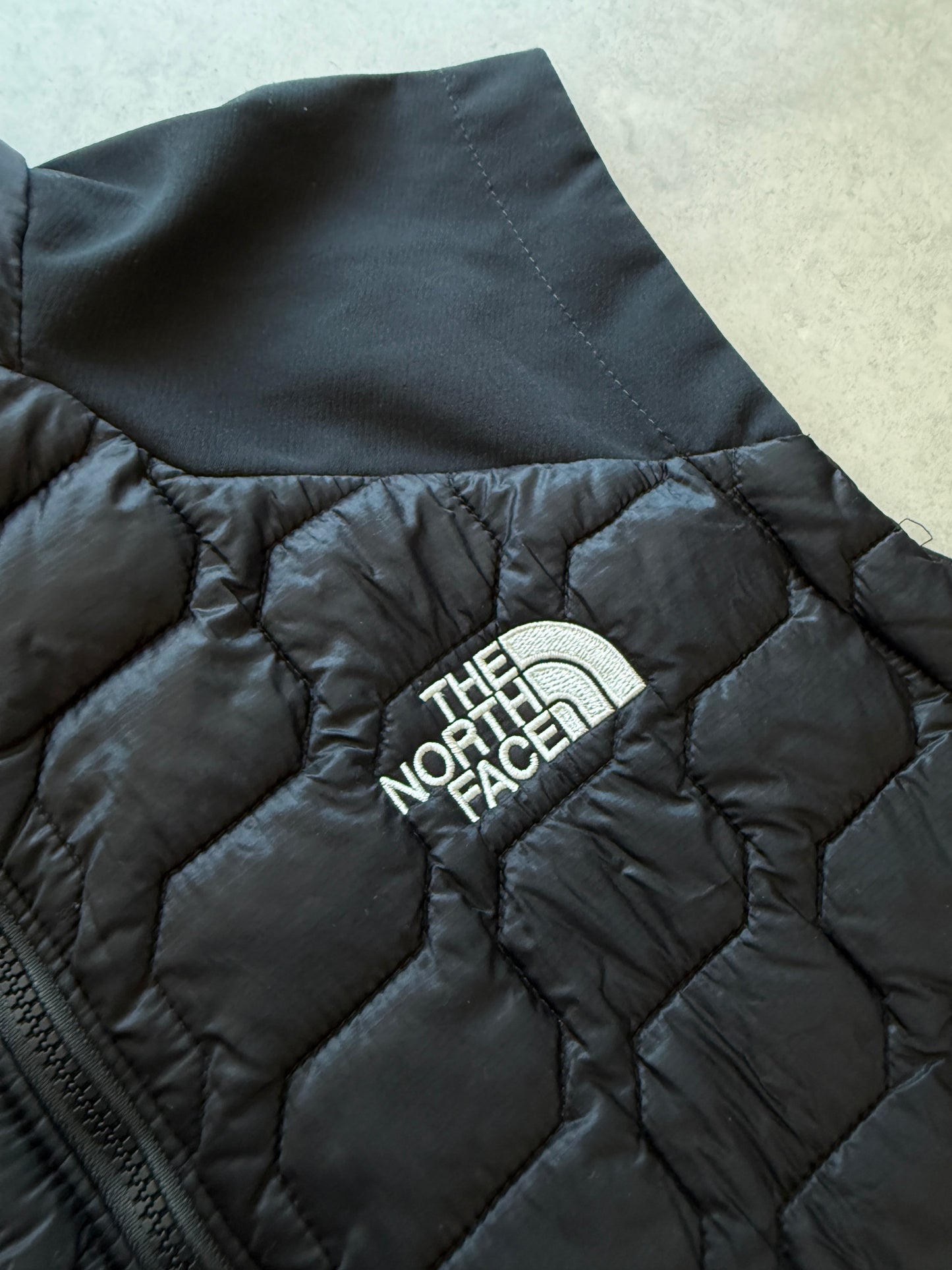 The North Face muški crni tanki prsluk (M)