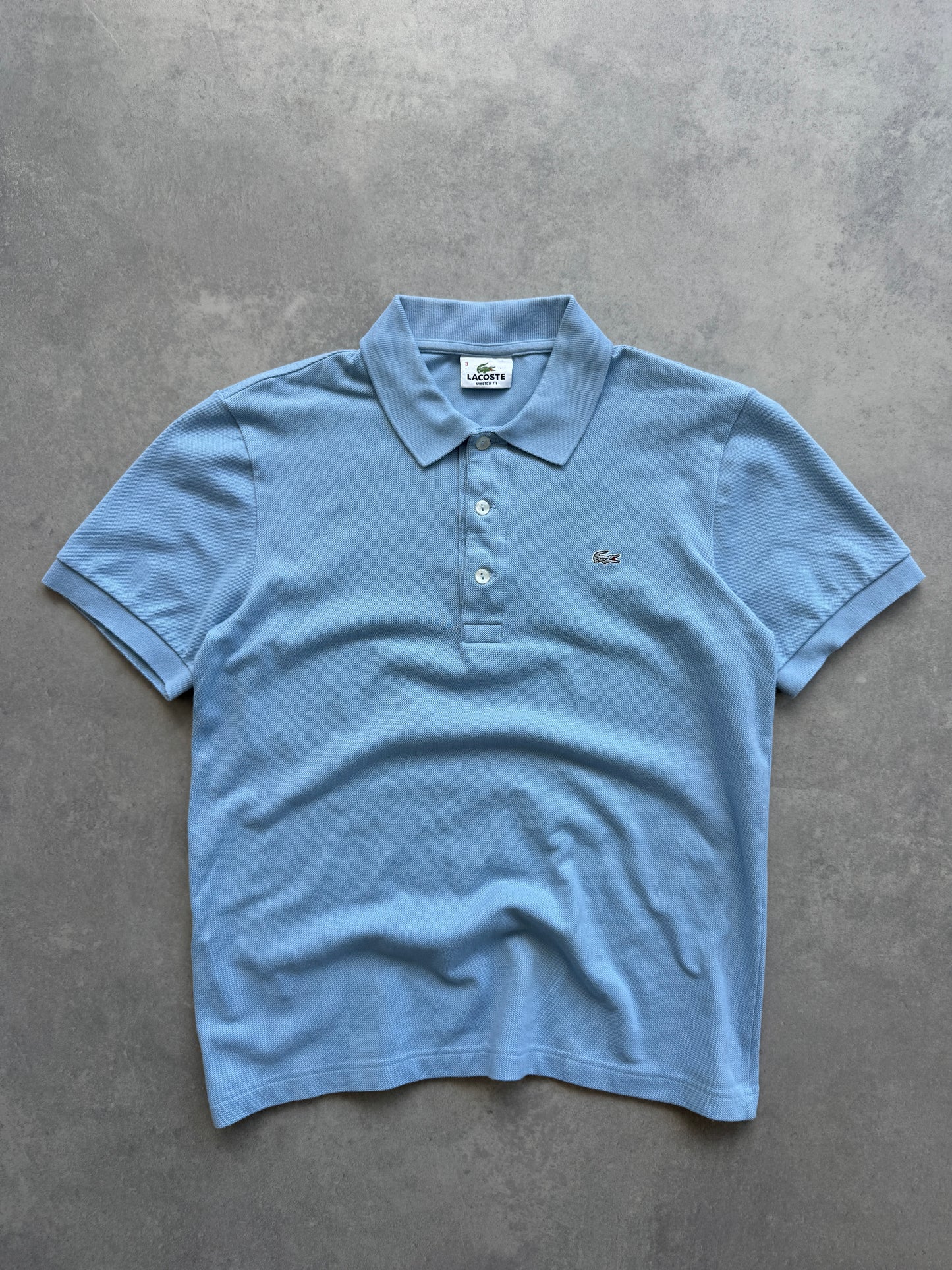 Lacoste muška plava polo majica (S)